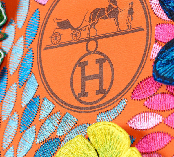 Hermes Floral Petals - Sweeping floral petals decorate these up-cycled lu