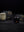 Tatine candles and packaging on a dark background