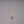 SKULL NECKLACE / TRAVIS BARKER