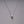 SKULL NECKLACE / TRAVIS BARKER
